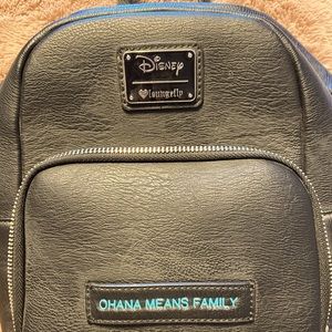 Practically new, leather purse/backpack Disney with stitch them + change purse